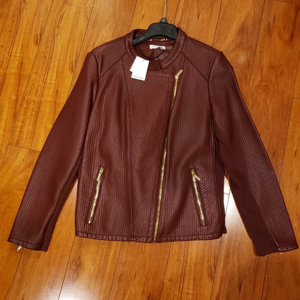 Calvin Klein faux leather burgundy jacket.
